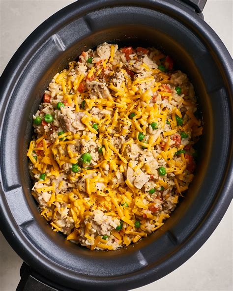 Rice in slow cooker - In a large skillet, cook sliced smoked sausage over medium-high heat until it starts to brown. Transfer to the slow cooker. Add dry red kidney beans, onion, water or chicken stock. tomato sauce, garlic clove, green bell pepper, and creole seasoning. Stir and cover the slow cooker. Cook on LOW setting until the beans are tender.